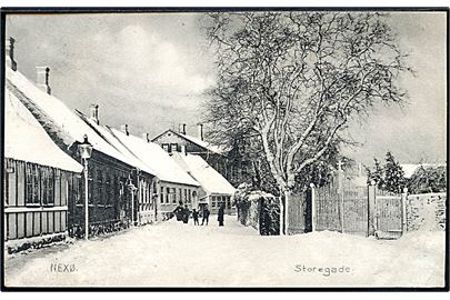 Bornholm. Nexø, Storegade i sne. Broder Schjørring no. 14?93. 