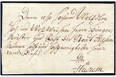 1754. Portobrev med indhold dateret d, 24.3.1754 og på bagsiden håndskrevet bynavn Slage(else) til Husum i Schleswig. Modtager betalt 7+1 sk. i porto.
