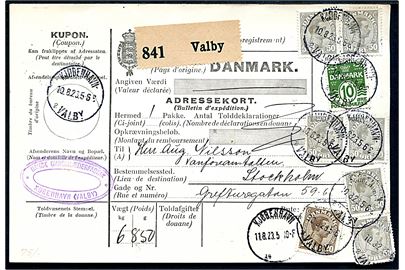 10 øre Bølgelinie, 20 øre og 50 øre (6) Chr. X på 3,30 kr. frankeret internationalt adressekort for pakke fra Kjøbenhavn - Valby d. 10.8.1923 til Stockholm, Sverige. Et mærke yderligt placeret.