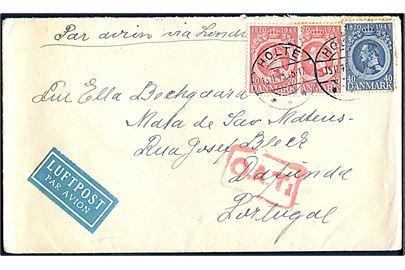 20 øre (2) og 40 øre Chr. X 75 år på luftpostbrev mærket “Par Avion via London” fra Holte d. 15.11.1945 via Lissabon til Dafunda, Portugal. Rødt rammestempel “O.A.T.” (Onward Air Transmission” fra London.