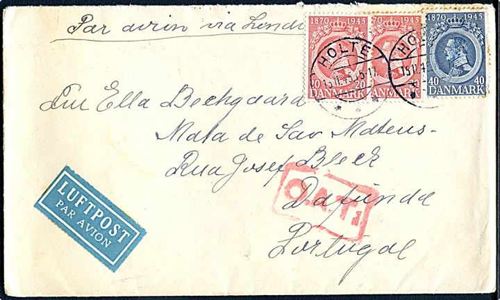 20 øre (2) og 40 øre Chr. X 75 år på luftpostbrev mærket “Par Avion via London” fra Holte d. 15.11.1945 via Lissabon til Dafunda, Portugal. Rødt rammestempel “O.A.T.” (Onward Air Transmission” fra London.