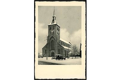 Odense, Sct. Knuds kirke i sne med automobil. Stenders no. 76252.