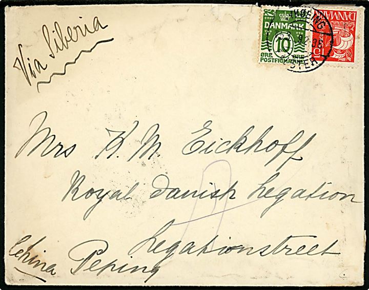 10 øre Bølgelinie og 15 øre Karavel på brev påskrevet via Sibiria fra Nykøbing Falster d. 15.3.1929 til Peking, Kina. Bagklap revet.
