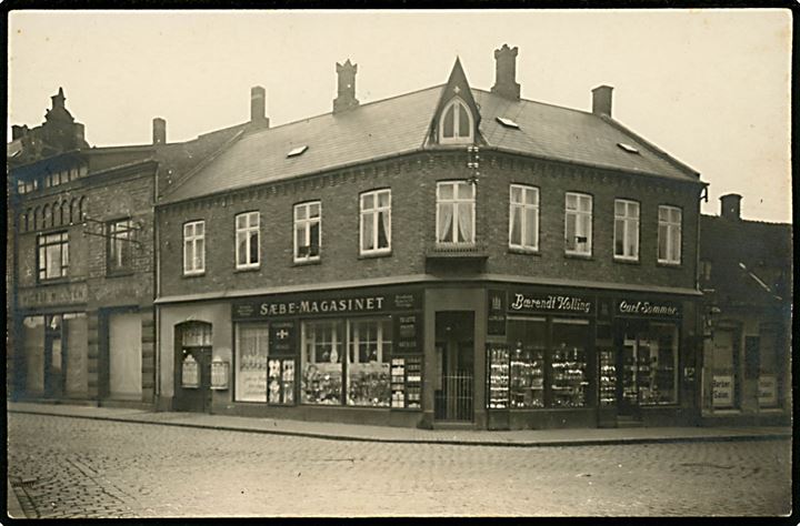 Rønne, Lille torv med Sæbe-Magasinet og Guldsmed Bærendt Kolling's forretning. Fotokort u/no.