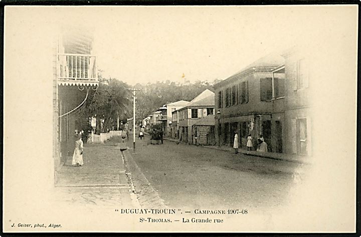 D.V.I., St. Thomas, la Grande rue. Fransk kort fra krydseren Duguay-Trouins rejse 1907-08. J. Geiser u/no.