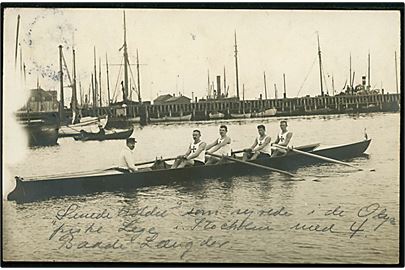 Nykøbing F., Firer med styrmand fra Nykøbing Falster Roklub. Danmarks eneste guldvinder ved olympiaden i Stockholm 1912. Fotokort anvendt i Nykøbing juli 1912.