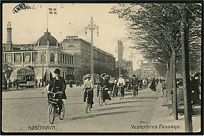 Købh., Vesterbros Passage med cyklister og i baggrunden en sporvogn. Stenders no. 6088