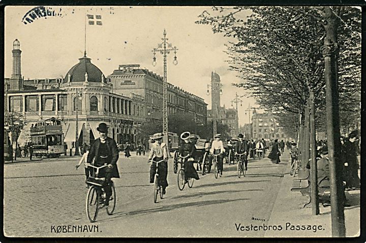 Købh., Vesterbros Passage med cyklister og i baggrunden en sporvogn. Stenders no. 6088