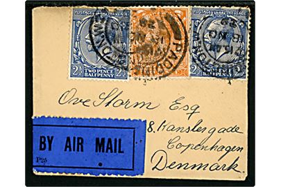 Britisk 2d og 2½d (2) George V på lille luftpostbrev (5½x7 cm) fra Paddington d. 18.11.1929 via Berlin C2 d. 19.11.1929 og dansk bureau København - Warnemünde T.74 d. 19.11.1929 til København, Danmark. Luftpostbefordret fra London til Berlin og her stemplet Beförderung mit Flugpost unterbleiben / Flug nicht ausgeführt. / BERLIN C2. Briefpostamt og videresendt med tog til København. Dekorativt lille brev.