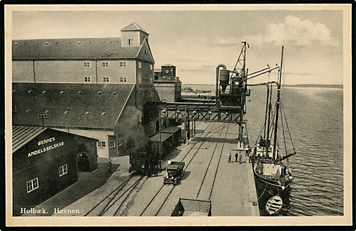 Holbæk. Havnen med banelinien og lokomotiv med godsvogne. R. Olsen no. 941.