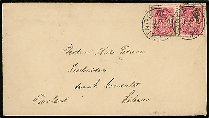 10 øre Våben anilinrød i parstykke på brev annulleret lapidar Helsinge d. 15.6.1888 til danske konsulat i Libau, Rusland.