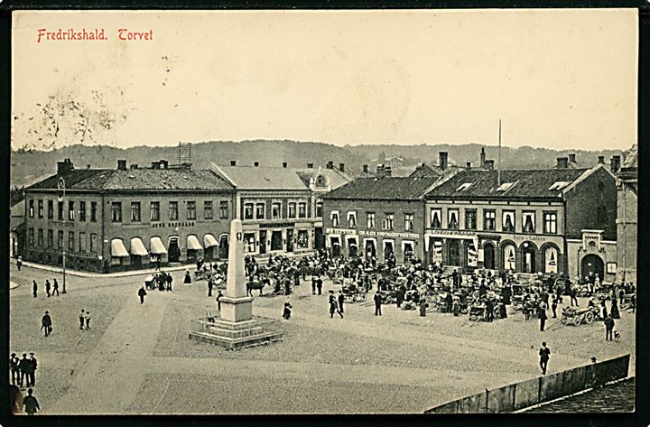 5 øre Posthorn på brevkort (Frederikshald, Torvet) skrevet ombord på skoleskibet Viking og stemplet Frederikshald d. 16.1.1911 til København, Danmark.