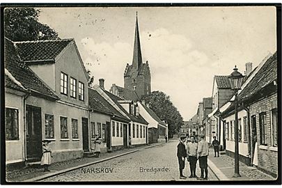 Nakskov, Bredgade. Stenders no. 12295. Frankeret med 5 øre Fr. VIII fra Nakskov d. 29.6.1908 til Østerby på Fejø. Ank.stemplet brotype Ia Fejø d. 30.6.1908.