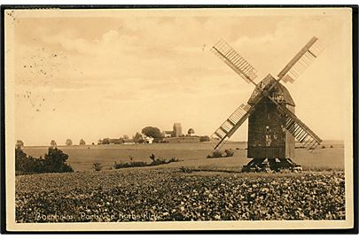 Bornholm, mølle med Ruths kirke i baggrunden. F. Sørensen no. 2127.