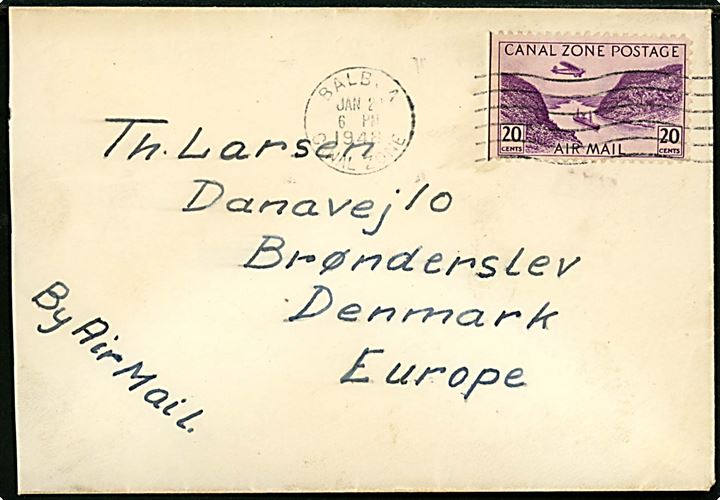 Canal Zone 20 cents på luftpostbrev fra sømand ombord på J. Lauritzen skibet M/S Gladys Dan i Balboa d. 24.1.1948 til Brønderslev, Danmark. Medfølger 10 små fotografier af skibet, passage af Panama kanal og i New York. 