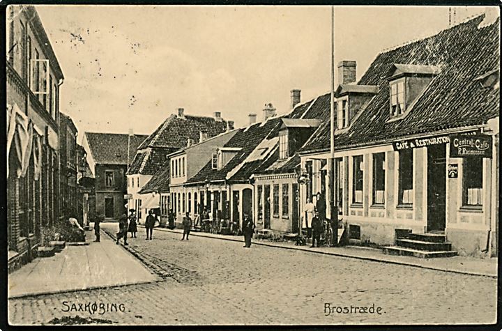 Sakskøbing. Brostræde med R. Rasmussens Cafe og Restauration. Julius Lund no. 14421. 