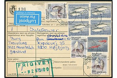 3 kr. Jagtfalk (3), 10 kr. Rejer og 50 kr. Skællaks (fireblok) på 119 kr. frankeret adressekort for luftpostpakke fra 3922 Nanortalik Tasiussaq d. 29.11.1989 til Højbjerg, Danmark.