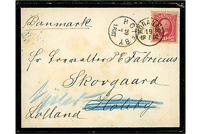 10 öre Oscar II på sørgekuvert fra Höganäs d. 19.7.1892 til Skovgaard pr. Holeby, Danmark - omadresseret til Nysted med lapidar Holeby d. 20.7.1892