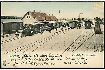 Aakirkeby, jernbanestation med holdende damptog. Peter Alstrup no. 3632.
