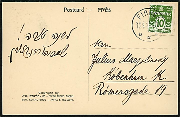 10 øre Bølgelinie på brevkort (Gadeparti fra Tel-Aviv) med kort besked på hebræisk annulleret med brotype IIIb Firhøj d. 15.9.1928 til den jødiske personlighed Julius Margolinsky i København.