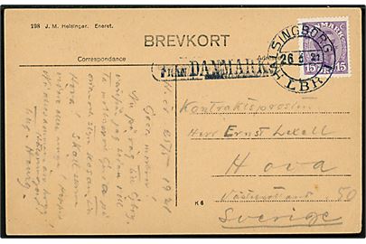 15 øre Chr. X på brevkort (Marienlyst ved Helsingør) annulleret med svensk stemdpel i Helsingborg d. 26.5.1921 og sidestemplet Från Danmark til Sverige.