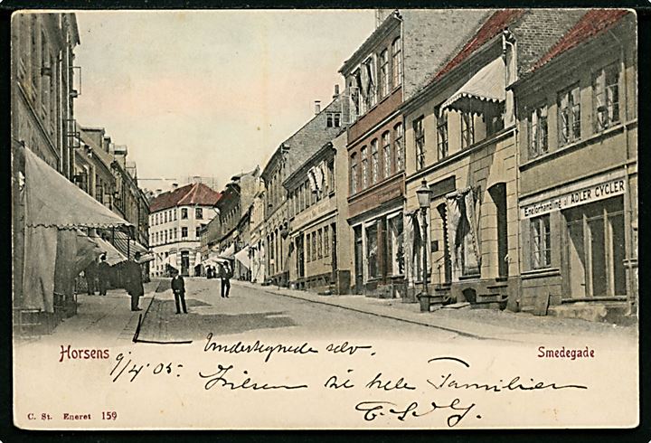 Horsens. Smedegade med Eneforhandler af Adler Cykler og mange andre forretninger. Stenders no. 159.