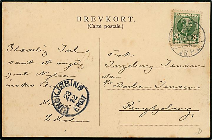 Skjern, gadeparti med kirke i baggrunden. I. Kristensen no. 3811. Frankeret med 5 øre Chr. IX fra Skjern d. 22.12.1906 til Ringkøbing. Ank.stemplet med lapidar Ringkjøbing d. 23.12.1906 - stempel brugt som reservestempel i juleperioden 1906.