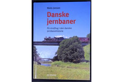 Danske jernbaner - På strejftog i den danske jernbanehistorie af Niels Jensen. 142 sider illustreret jernbanehistorie med 13 spændende eller interessante historier.