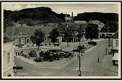 Vejle, Nørretorv med automobiler og reklame for Mesterrække Fodbold på stadion. Stenders no. 80619.