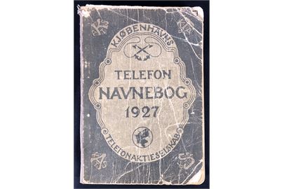 Kjøbenhavns Telefonaktieselskab Telefon Navnebog 1927. Slidt, men omfattende opslagsværk incl. reklametillæg. 