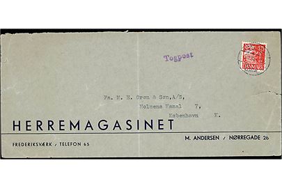 15 øre Karavel på aflang kuvert fra Frederiksværk annulleret København Omk. d. 5.12.1934 og sidestemplet Togpost til København. Fold og rift.