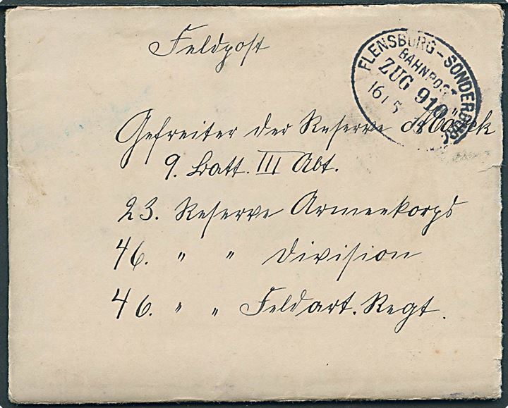 Ufrankeret feltpostbrev fra Holbüll b. Hockerup med ovalt bureaustempel Flensburg - Sonderburg Zug 910 d. 16.5.1915 til soldat i 46 Reserve Feldart. Regiment. Fuldt indhold.