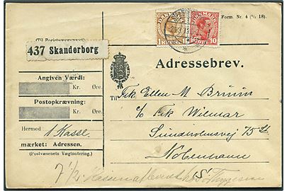 10 øre og 1 kr. Chr. X på adressebrev for pakke fra Skanderborg d. 24.3.1919 til København.