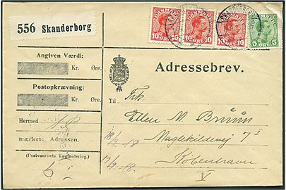 5 øre og 10 øre (3) Chr. X på adressebrev for pakke fra Skanderborg d. 18.9.1918 til Kjøbenhavn.